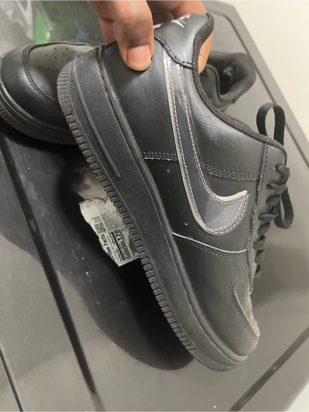 Nike Black Low-Top Sneakers with Glossy Swoosh